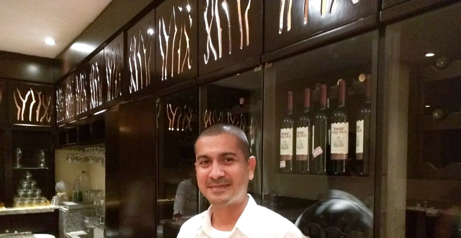 Omar, the restaurant manager at Andrea, in the dining room at Velas Vallarta, Puerto Vallarta